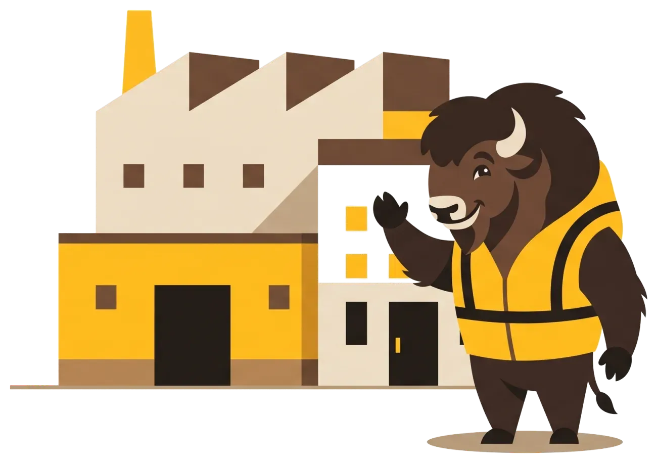 El bisonte saluda delante de una fábrica.